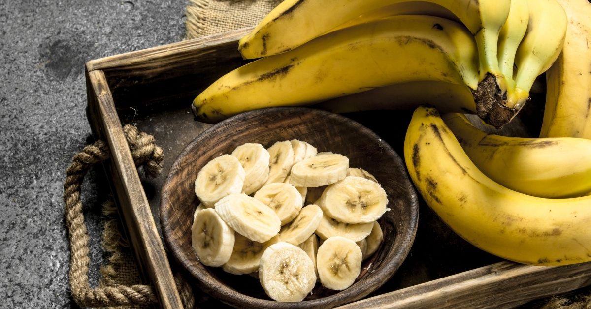 Bowl of Sliced Banana on Wooden Tray