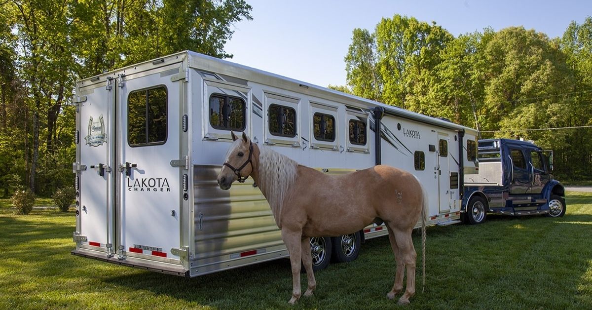 Living Quarters Horse Trailers on a field of grass